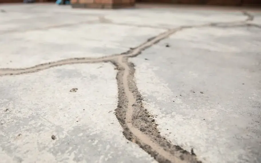 Cracked concrete surface with a patch repair