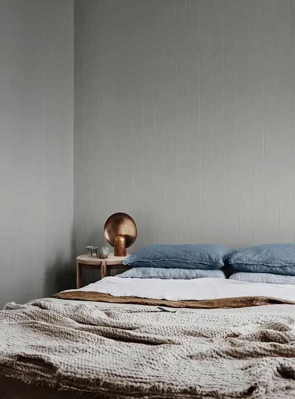 interior bedroom with blue and grey details.