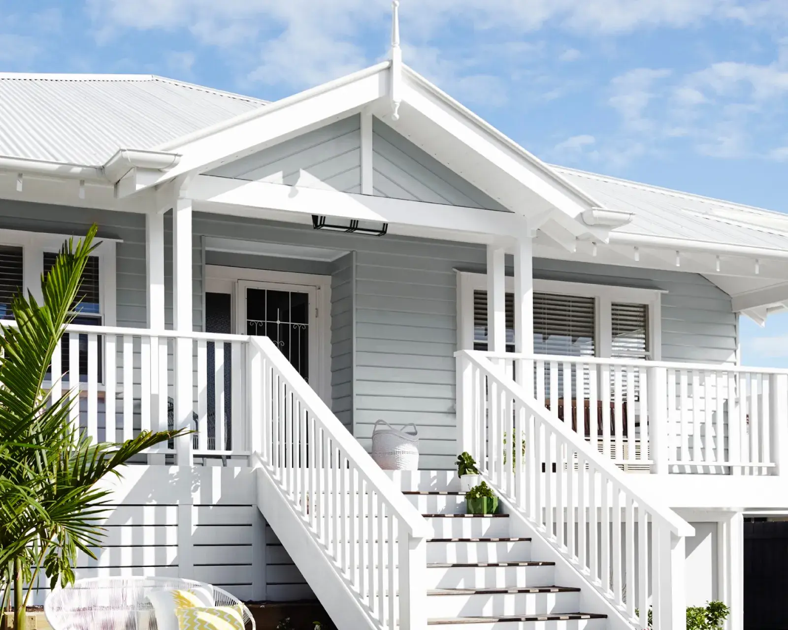 Hamptons exterior style home painted in Dulux Miller Mood & Dulux Lexicon® half colours
