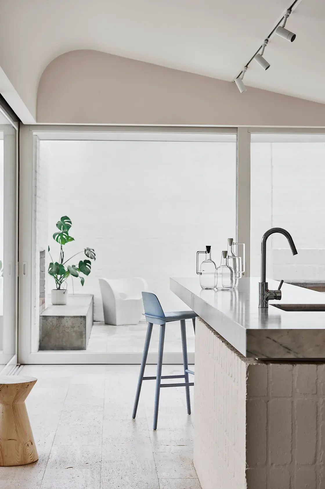 Neutral kitchen island bench with large windows