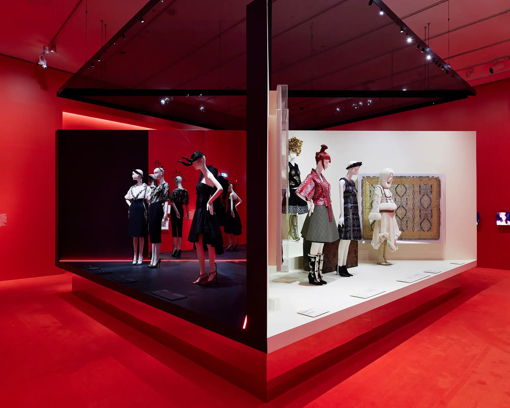 Alexander McQueen Installation at the National Gallery of Victoria with striking red background