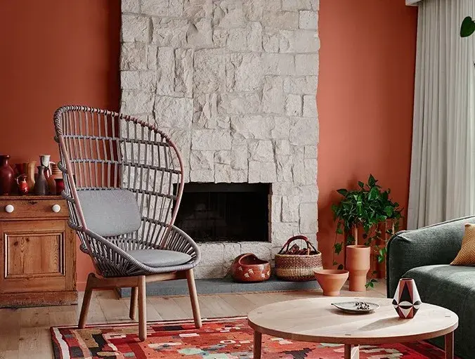 interior red lounge fireplace and chair.