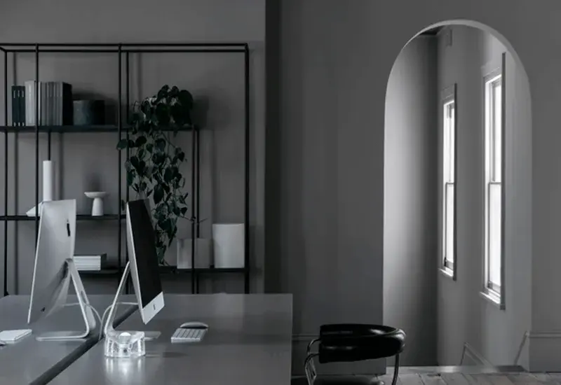 Grey office with arch entrance