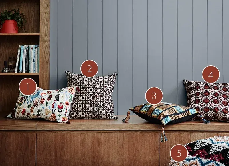 labelled bench seat with cushions.