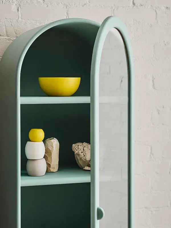 Interior green cabinet with yellow accents