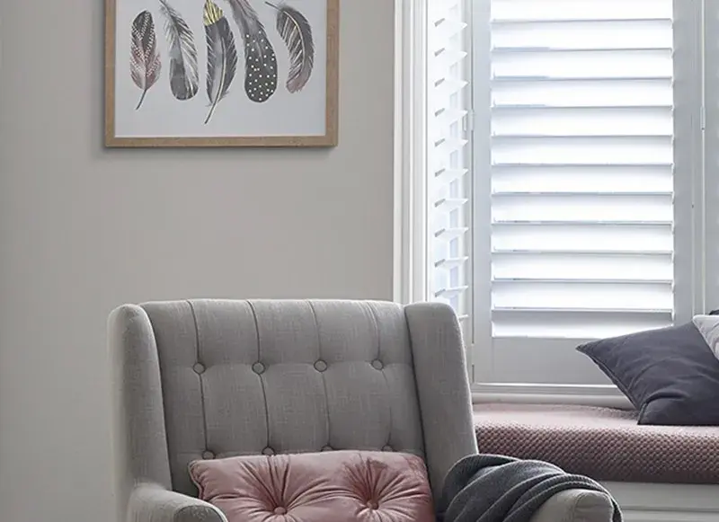 interior lounge room, close up on grey couch.