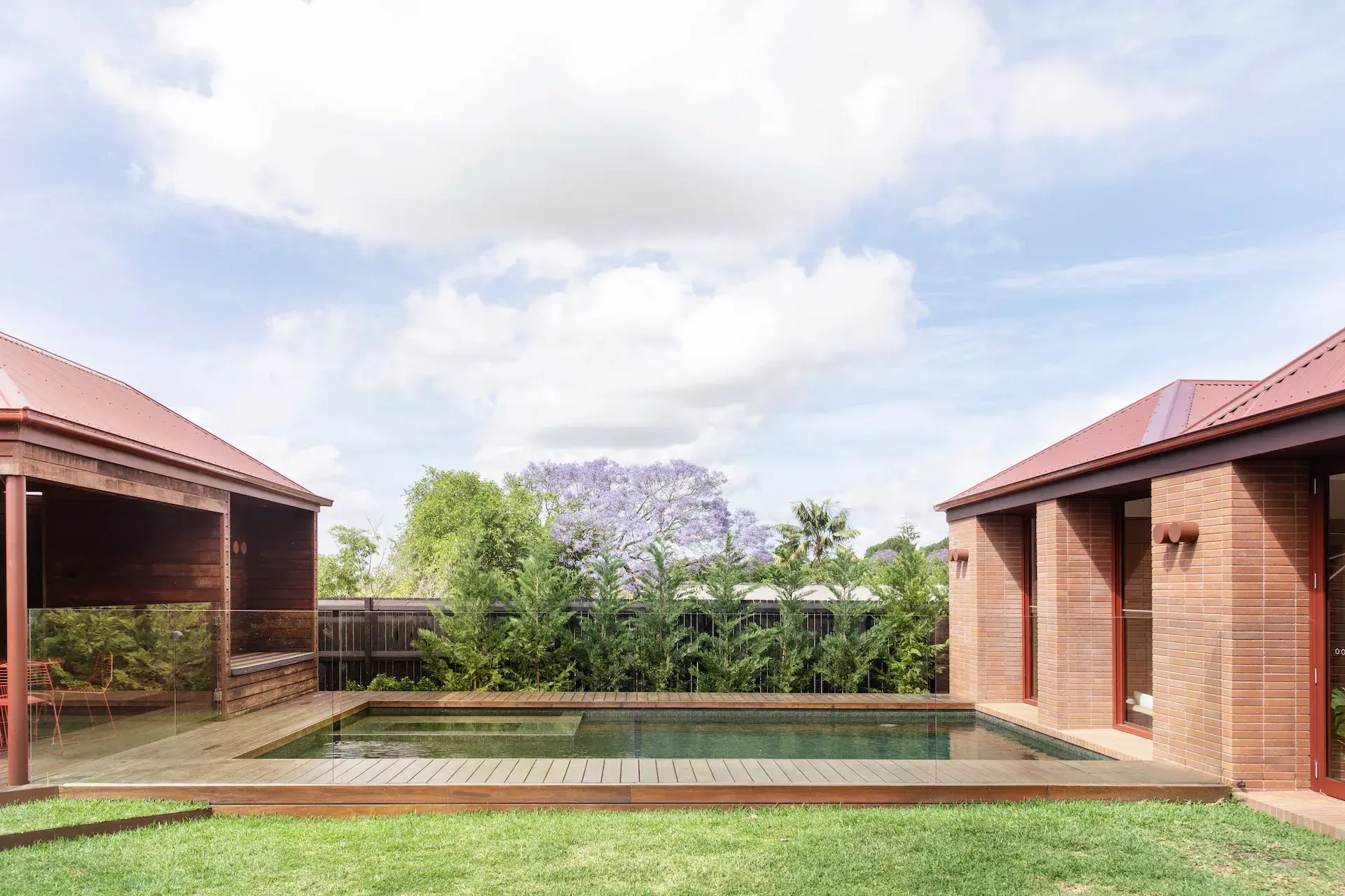 Brown brick house with swimming pool