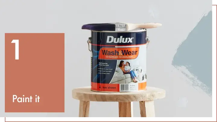 Dulux paint can on stool.