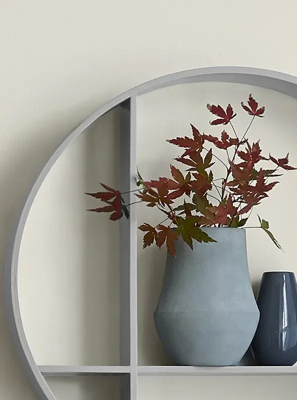 interior shelf close up with vases.