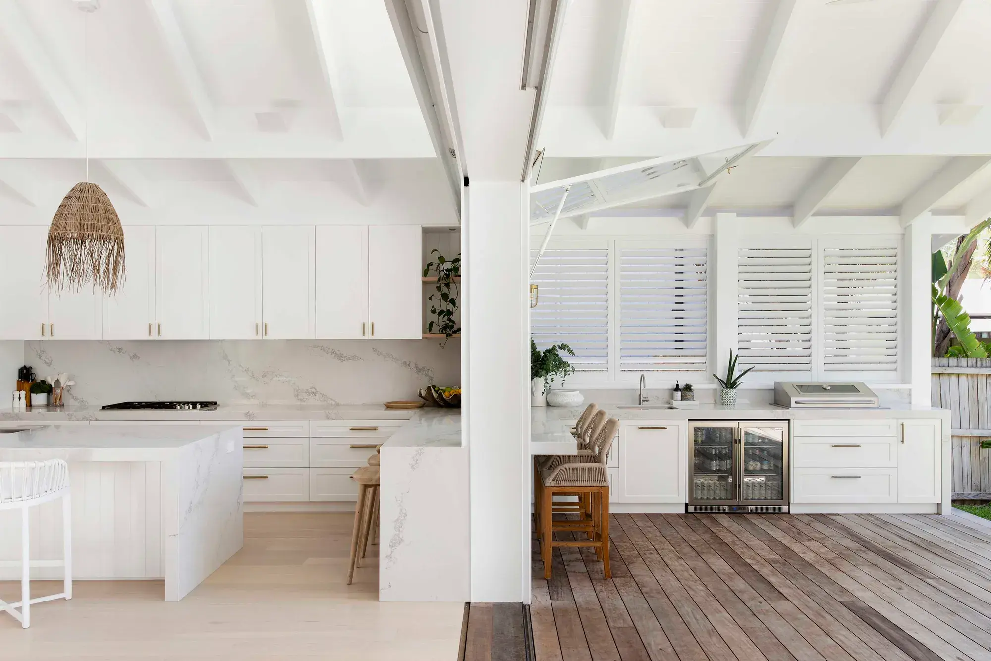 Kitchen leading out to timber deck entertaining area