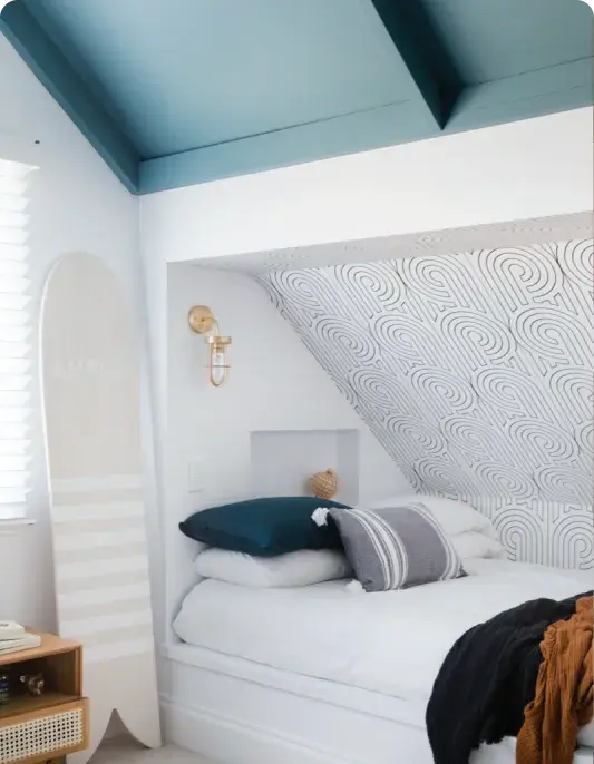Attic bedroom in blue-green and white