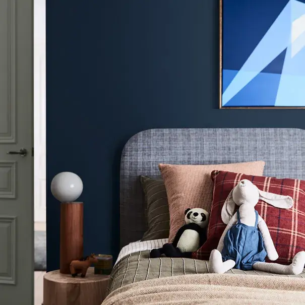 Child's bedroom with plush blankets