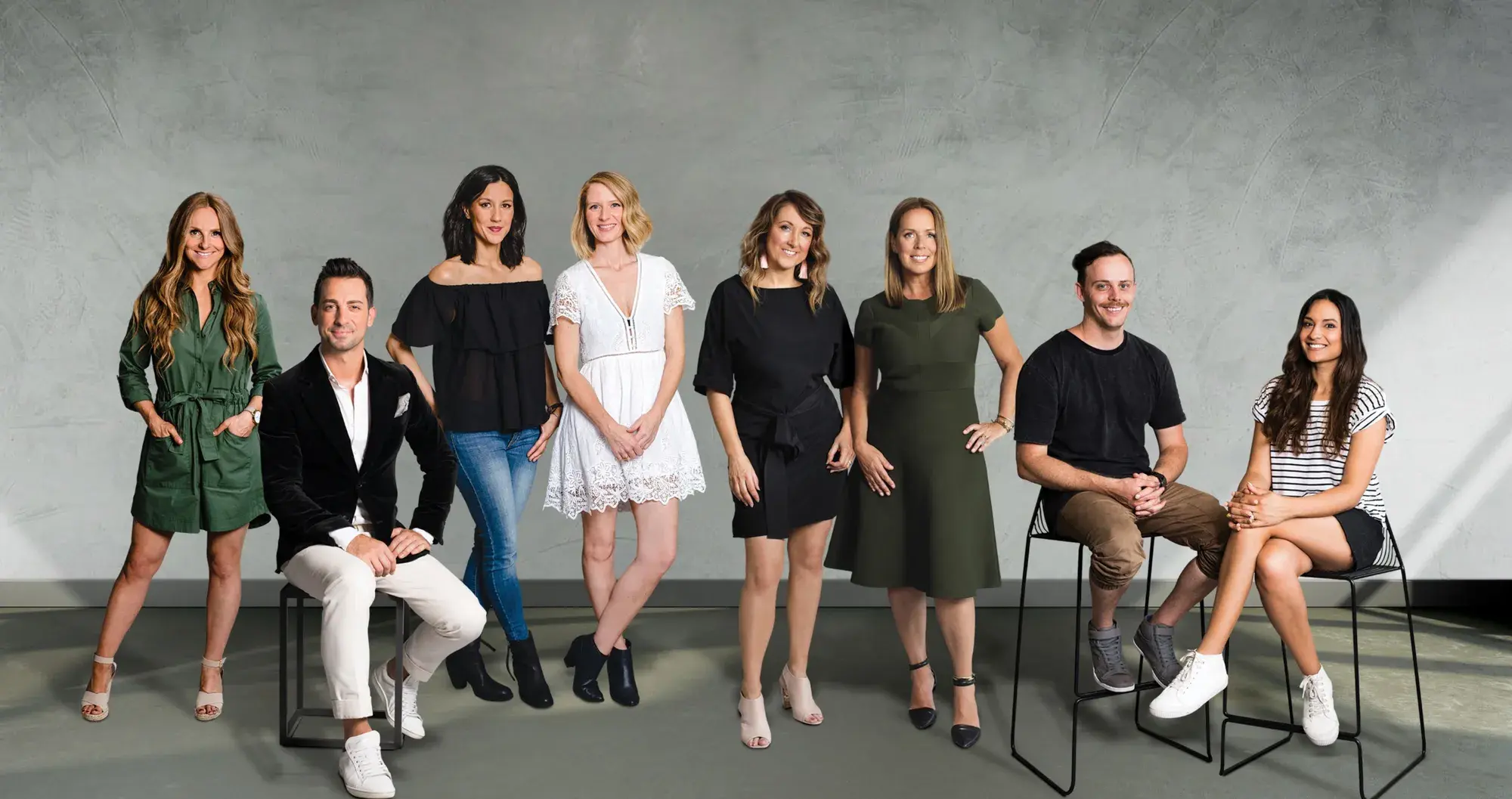 Group portrait of eight interior designers who work with Dulux 