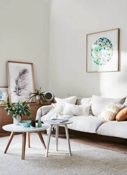 White sofa in a lounge room in Dulux Whisper White