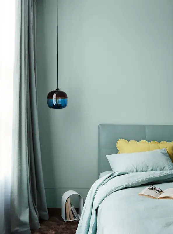 interior bedroom green and pendant lamp.